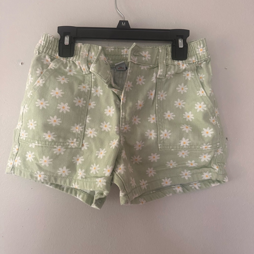 Green jean shorts with white flowers
